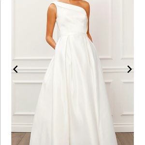 White, one shoulder gown with pockets.  Size 10 by ANABEL.